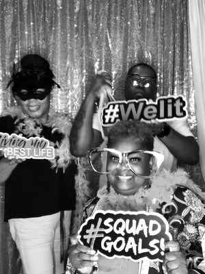 Black and white group photo booth print reading Squad Goals