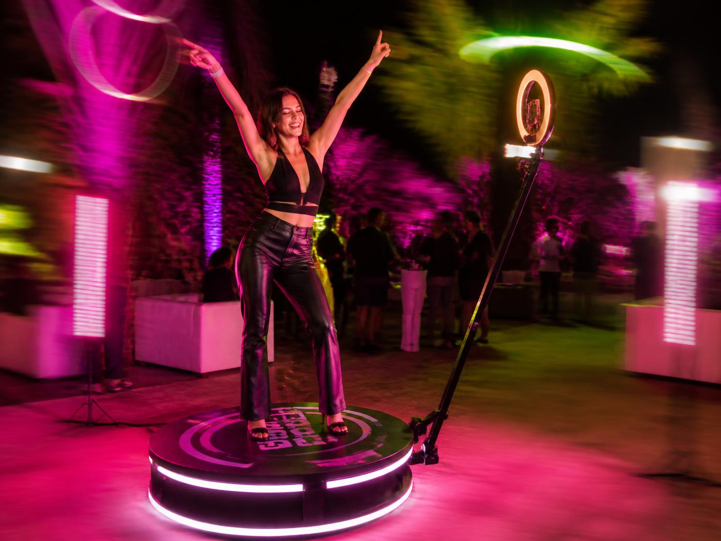 360 spinning booth with colorful event lighting